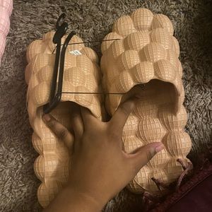 Never worn bubble slides!